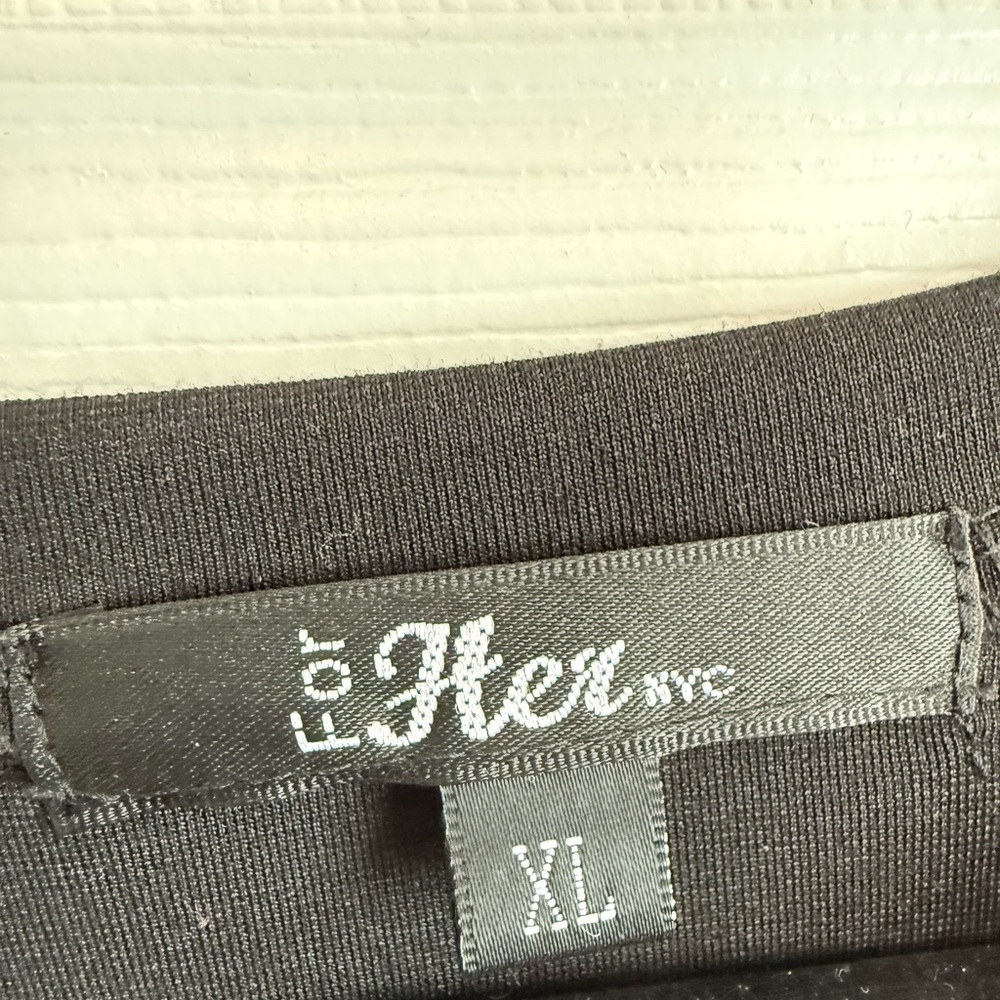 Elegant Black Top with Graphic and Sheer Sleeves - Picture 3 of 3